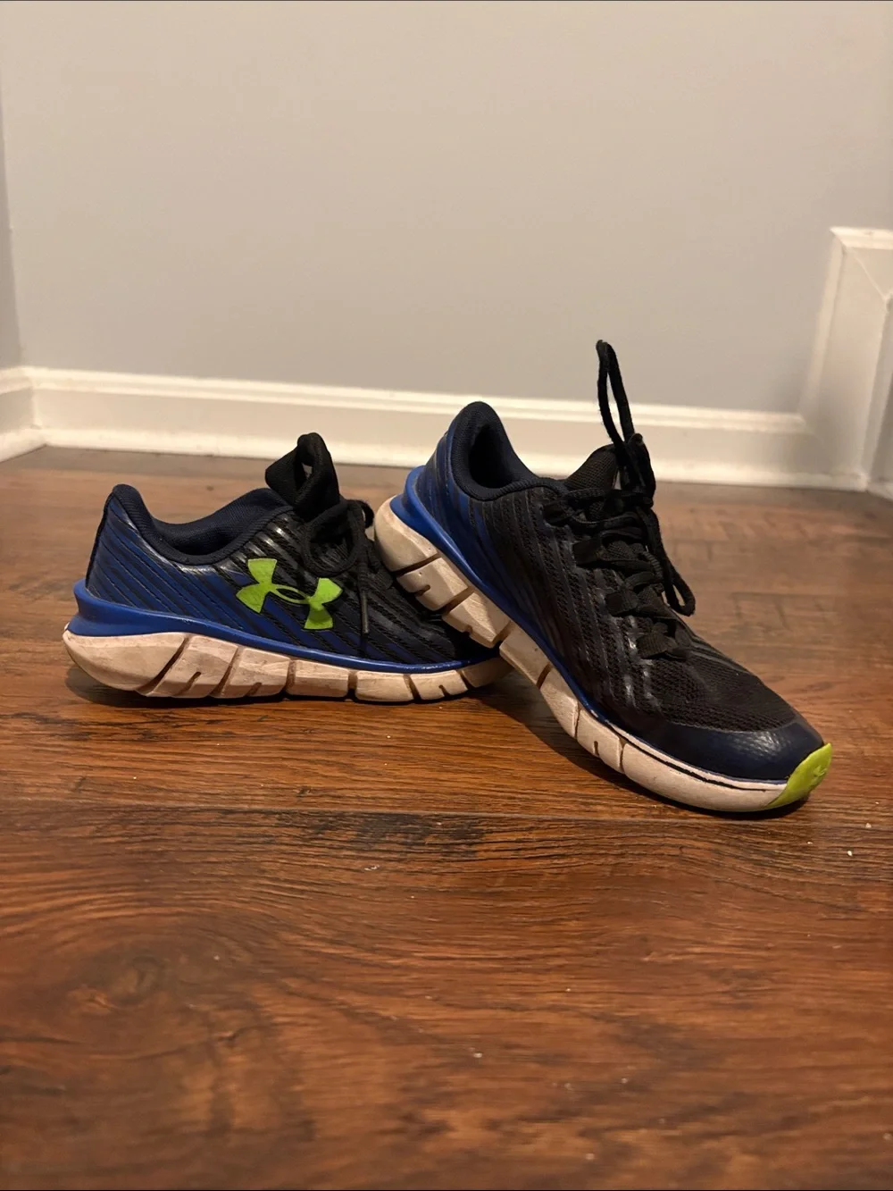 Under Armour Black and Navy Blue Running Shoes with Lime Accent